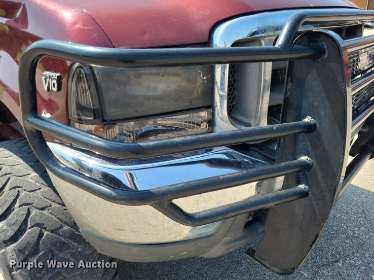 image for item DK1969 2000 Ford F250 Super Duty XLT  SuperCab flatbed pickup truck