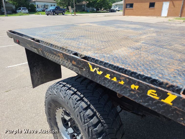 image for item DK1969 2000 Ford F250 Super Duty XLT  SuperCab flatbed pickup truck