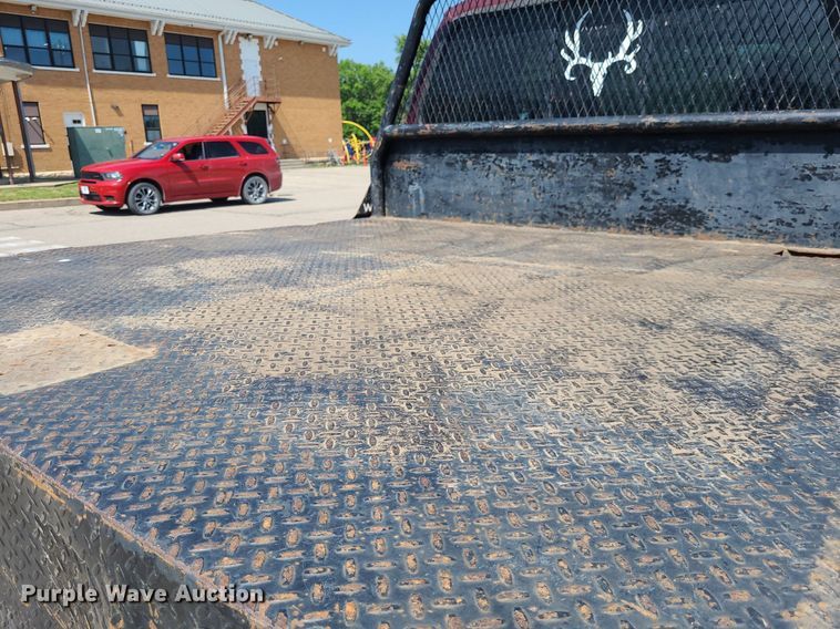 image for item DK1969 2000 Ford F250 Super Duty XLT  SuperCab flatbed pickup truck