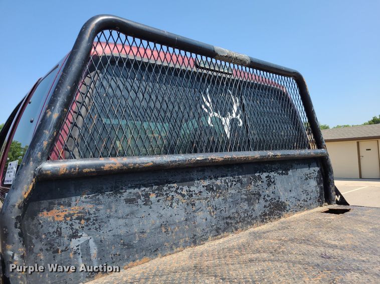 image for item DK1969 2000 Ford F250 Super Duty XLT  SuperCab flatbed pickup truck