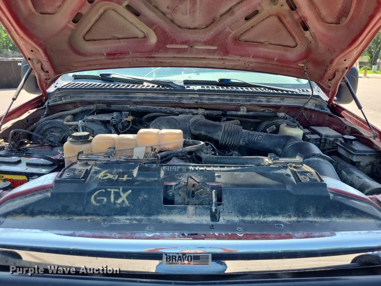 image for item DK1969 2000 Ford F250 Super Duty XLT  SuperCab flatbed pickup truck