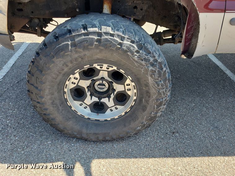 image for item DK1969 2000 Ford F250 Super Duty XLT  SuperCab flatbed pickup truck