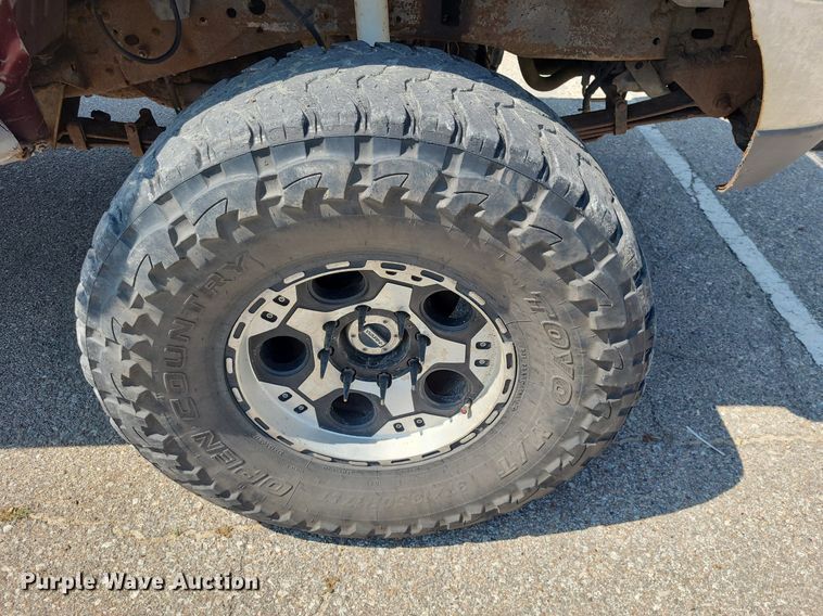 image for item DK1969 2000 Ford F250 Super Duty XLT  SuperCab flatbed pickup truck