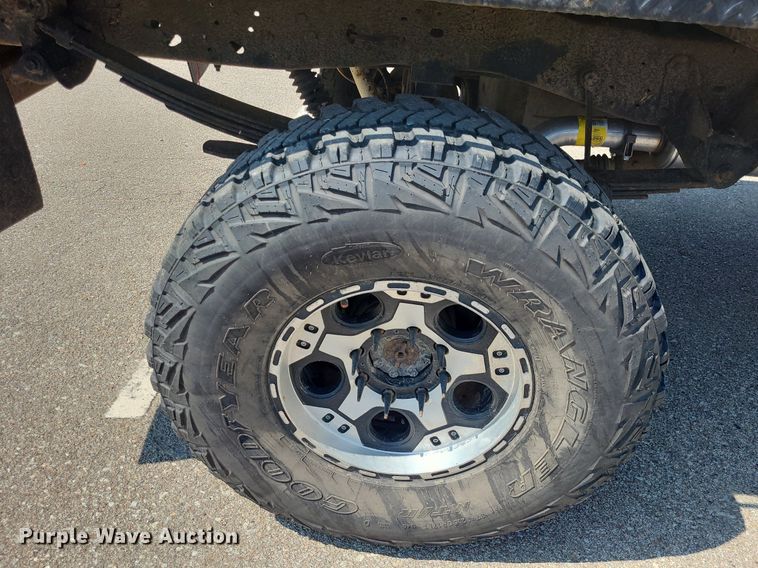 image for item DK1969 2000 Ford F250 Super Duty XLT  SuperCab flatbed pickup truck