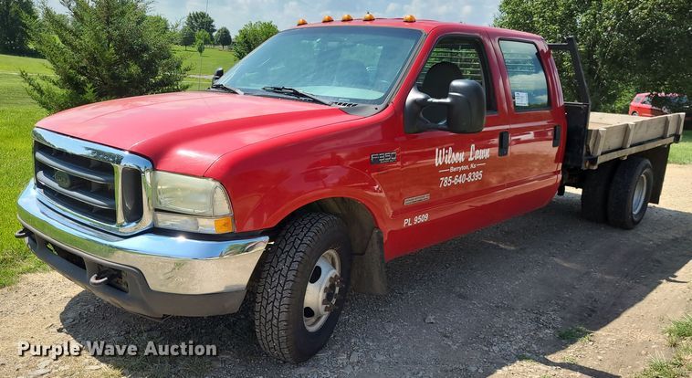 image for item DK1970 2004 Ford F350 Super Duty XL Crew Cab flatbed pickup truck