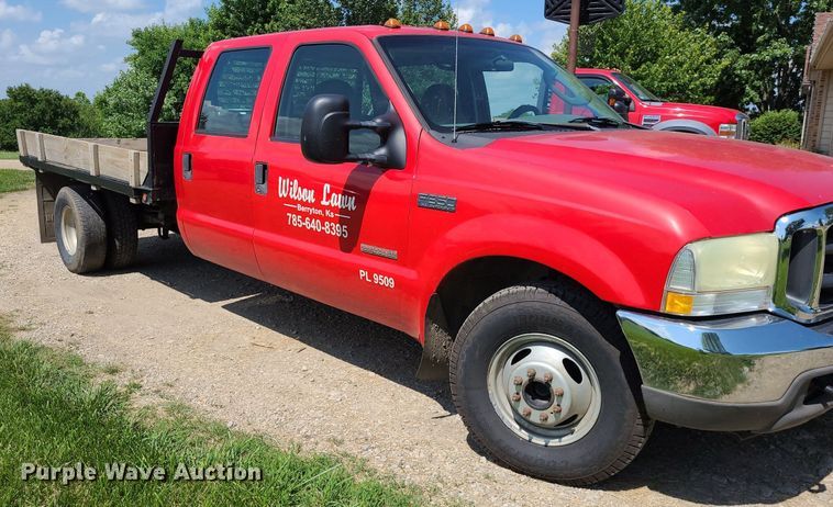 image for item DK1970 2004 Ford F350 Super Duty XL Crew Cab flatbed pickup truck