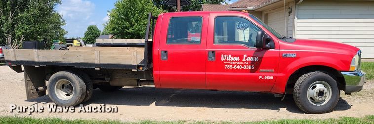 image for item DK1970 2004 Ford F350 Super Duty XL Crew Cab flatbed pickup truck