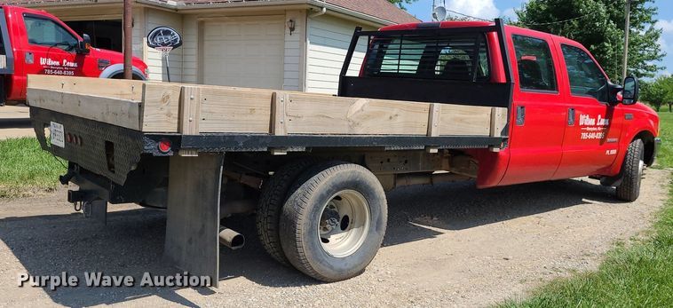 image for item DK1970 2004 Ford F350 Super Duty XL Crew Cab flatbed pickup truck