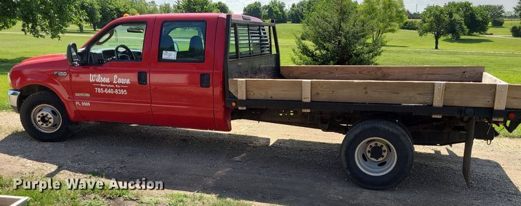 image for item DK1970 2004 Ford F350 Super Duty XL Crew Cab flatbed pickup truck