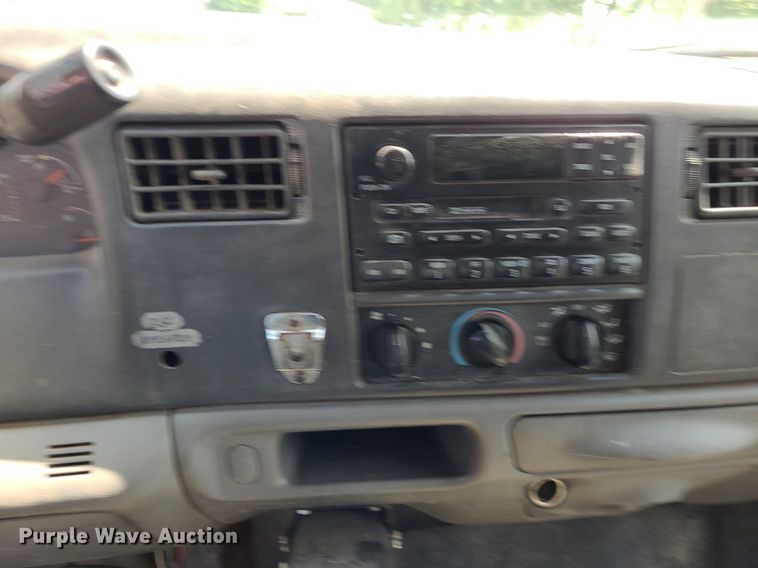 image for item DK1970 2004 Ford F350 Super Duty XL Crew Cab flatbed pickup truck