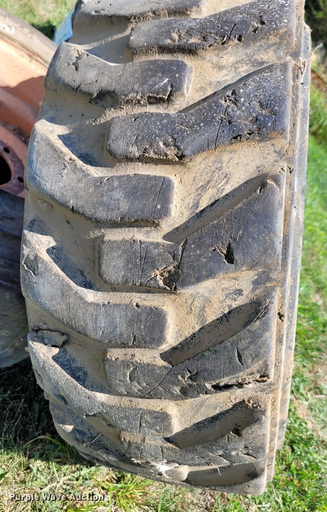 image for item DK1972 (4) Titan 10-16.5 skid steer tires and wheels