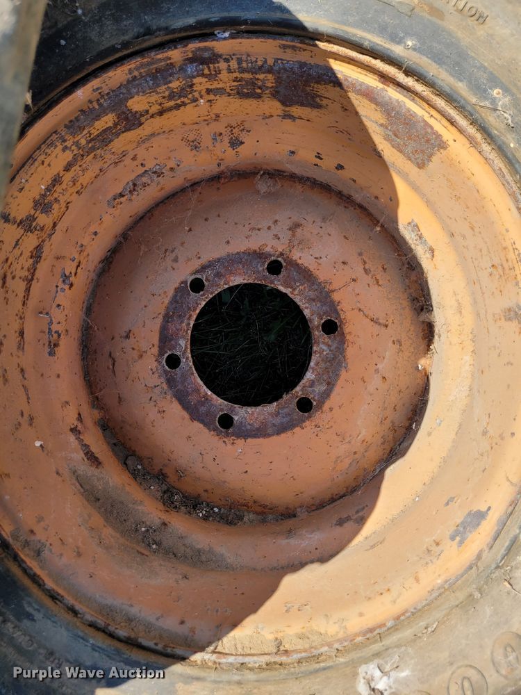 image for item DK1972 (4) Titan 10-16.5 skid steer tires and wheels