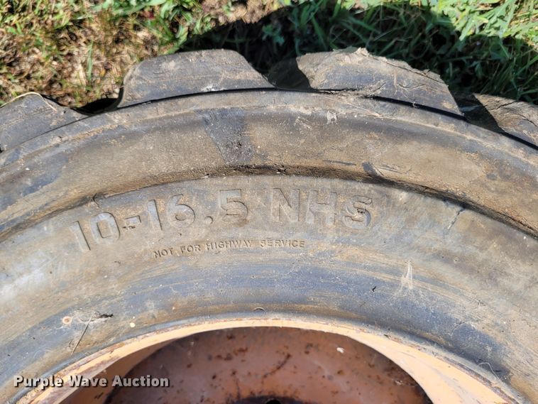 image for item DK1972 (4) Titan 10-16.5 skid steer tires and wheels