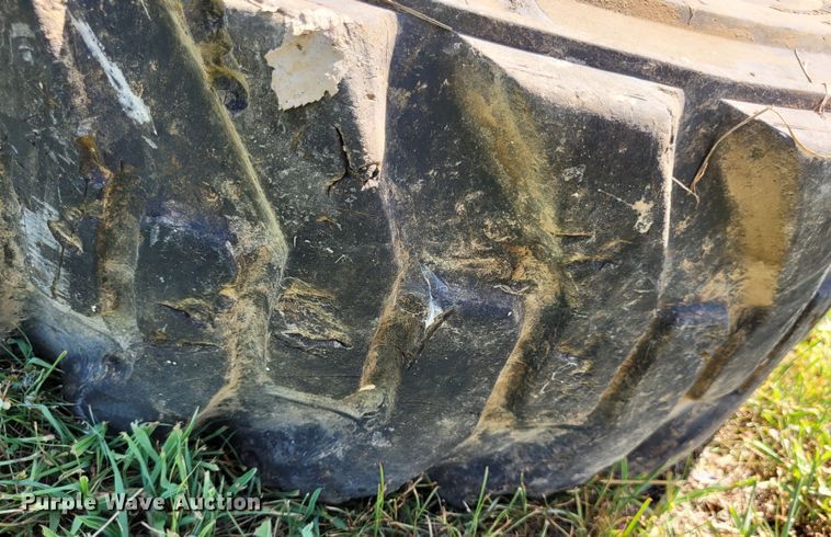 image for item DK1972 (4) Titan 10-16.5 skid steer tires and wheels