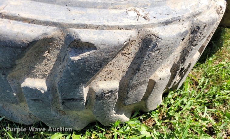 image for item DK1972 (4) Titan 10-16.5 skid steer tires and wheels