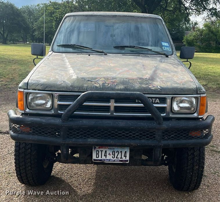 image for item DN3021 1987 Toyota Tacoma  Access Cab flatbed pickup truck