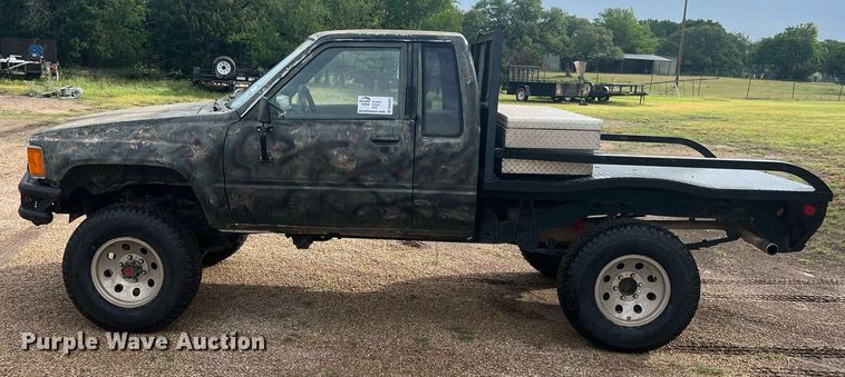 image for item DN3021 1987 Toyota Tacoma  Access Cab flatbed pickup truck