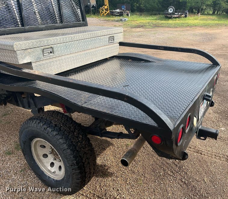 image for item DN3021 1987 Toyota Tacoma  Access Cab flatbed pickup truck