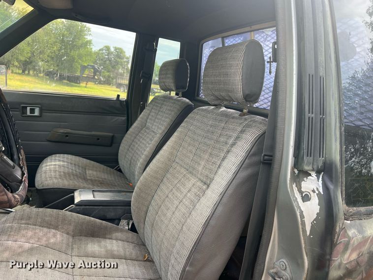 image for item DN3021 1987 Toyota Tacoma  Access Cab flatbed pickup truck