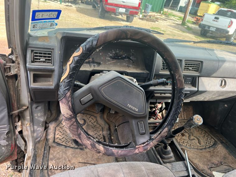 image for item DN3021 1987 Toyota Tacoma  Access Cab flatbed pickup truck