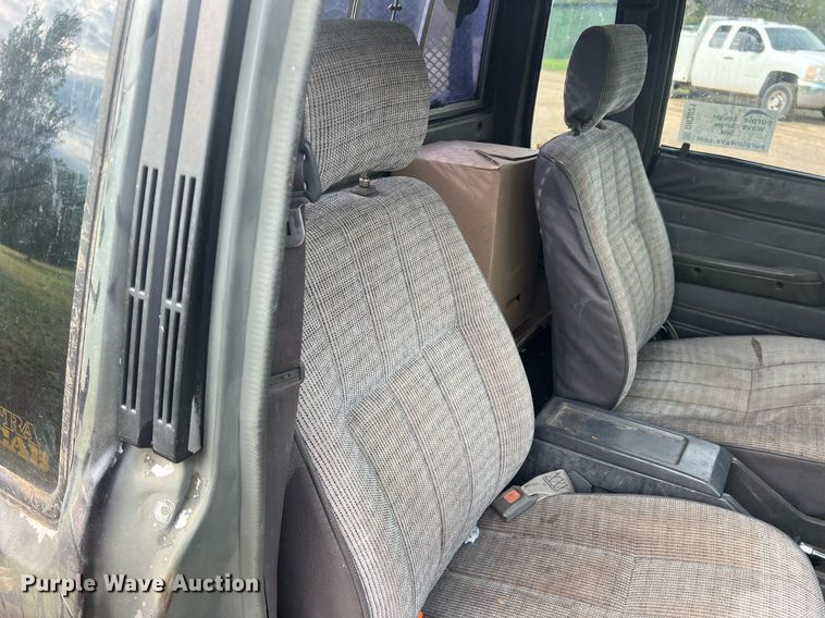 image for item DN3021 1987 Toyota Tacoma  Access Cab flatbed pickup truck