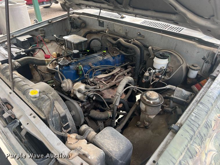 image for item DN3021 1987 Toyota Tacoma  Access Cab flatbed pickup truck