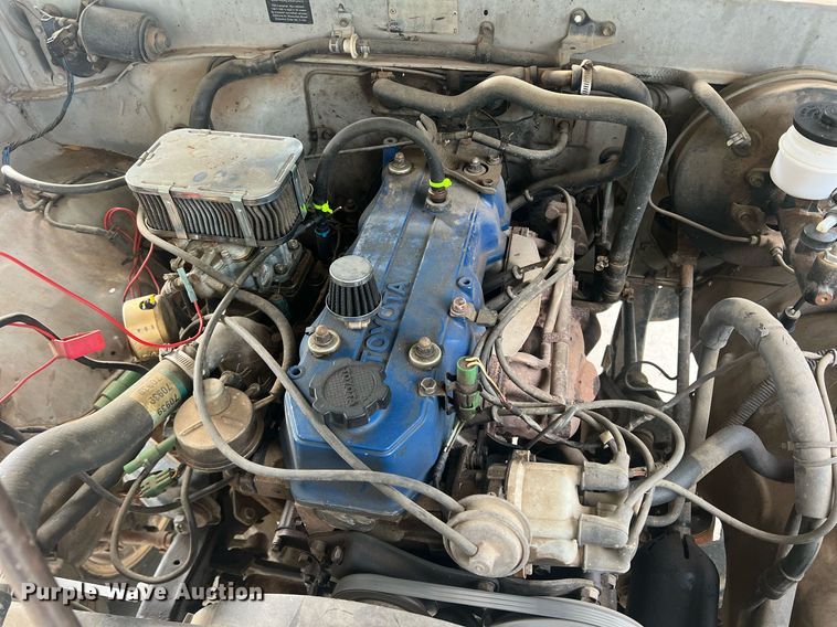 image for item DN3021 1987 Toyota Tacoma  Access Cab flatbed pickup truck