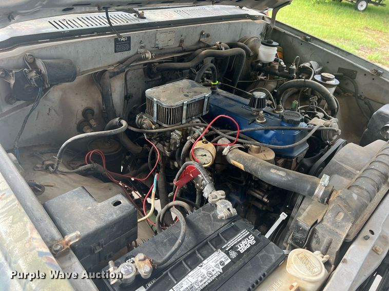 image for item DN3021 1987 Toyota Tacoma  Access Cab flatbed pickup truck