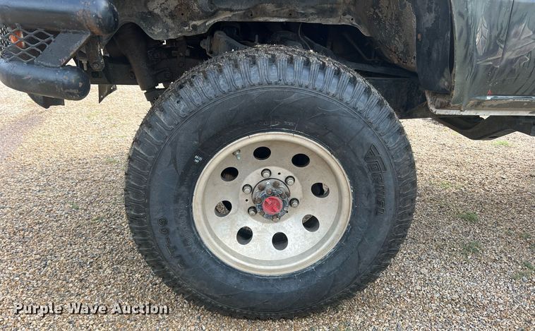 image for item DN3021 1987 Toyota Tacoma  Access Cab flatbed pickup truck