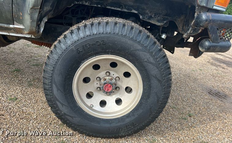 image for item DN3021 1987 Toyota Tacoma  Access Cab flatbed pickup truck