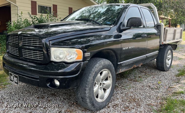 image for item DP0512 2004 Dodge Ram 1500  Quad Cab flatbed pickup truck