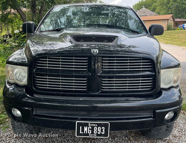 image for item DP0512 2004 Dodge Ram 1500  Quad Cab flatbed pickup truck