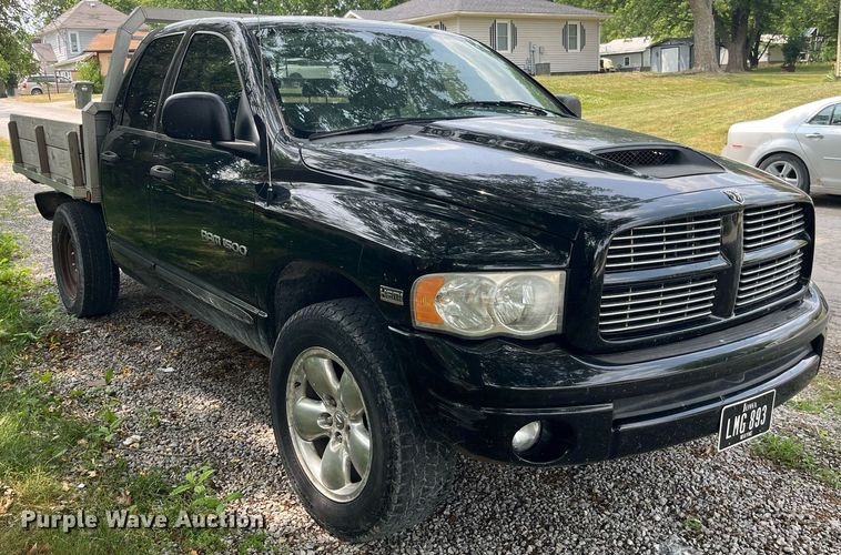 image for item DP0512 2004 Dodge Ram 1500  Quad Cab flatbed pickup truck