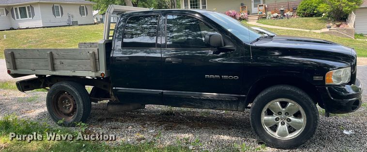 image for item DP0512 2004 Dodge Ram 1500  Quad Cab flatbed pickup truck