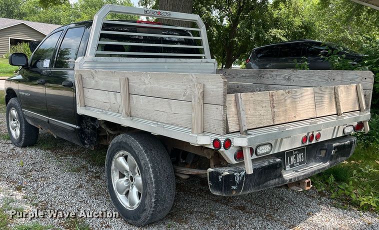 image for item DP0512 2004 Dodge Ram 1500  Quad Cab flatbed pickup truck