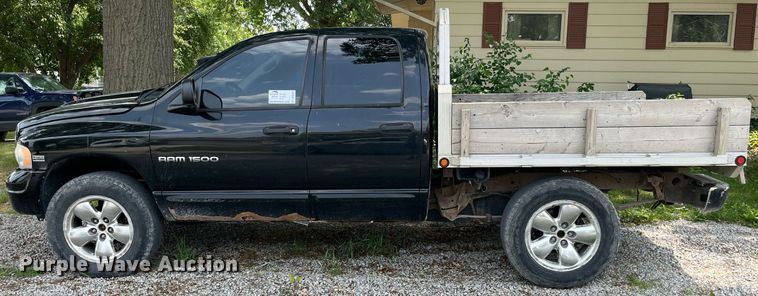 image for item DP0512 2004 Dodge Ram 1500  Quad Cab flatbed pickup truck