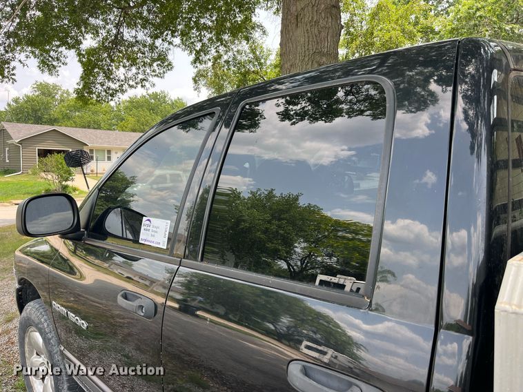 image for item DP0512 2004 Dodge Ram 1500  Quad Cab flatbed pickup truck