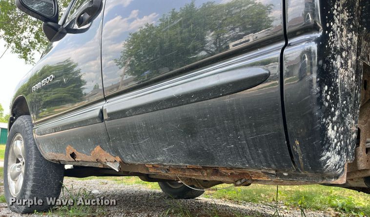 image for item DP0512 2004 Dodge Ram 1500  Quad Cab flatbed pickup truck