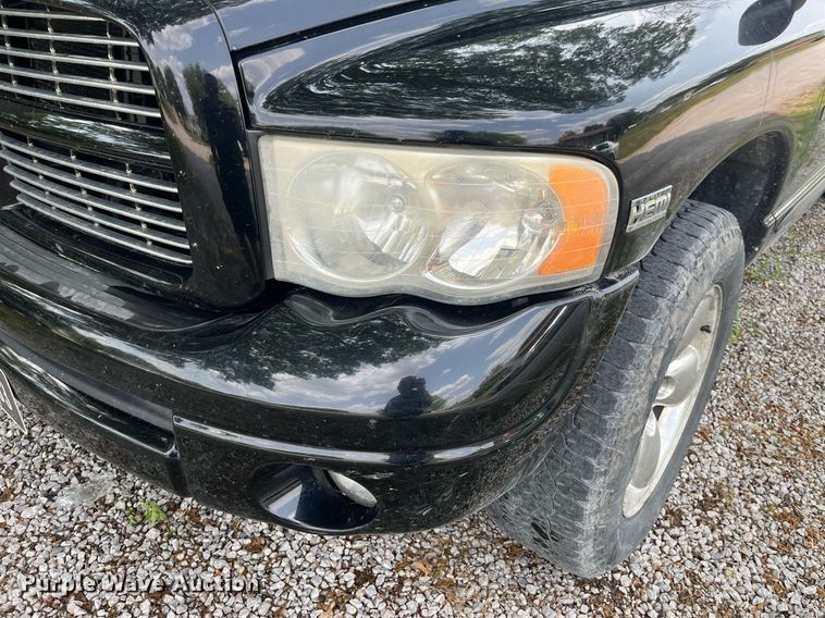 image for item DP0512 2004 Dodge Ram 1500  Quad Cab flatbed pickup truck