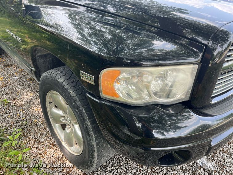 image for item DP0512 2004 Dodge Ram 1500  Quad Cab flatbed pickup truck