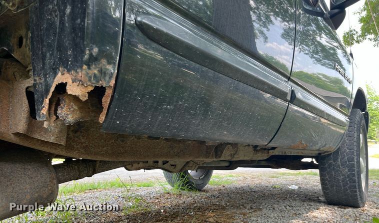 image for item DP0512 2004 Dodge Ram 1500  Quad Cab flatbed pickup truck