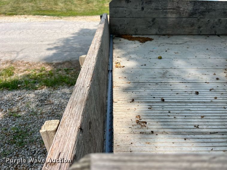 image for item DP0512 2004 Dodge Ram 1500  Quad Cab flatbed pickup truck