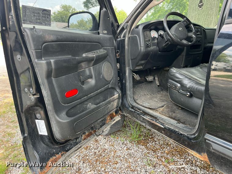 image for item DP0512 2004 Dodge Ram 1500  Quad Cab flatbed pickup truck