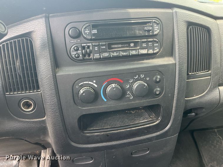 image for item DP0512 2004 Dodge Ram 1500  Quad Cab flatbed pickup truck