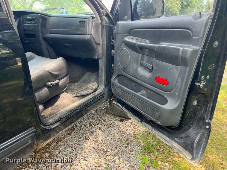 image for item DP0512 2004 Dodge Ram 1500  Quad Cab flatbed pickup truck