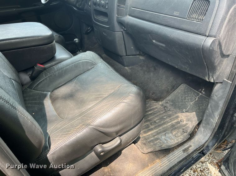 image for item DP0512 2004 Dodge Ram 1500  Quad Cab flatbed pickup truck