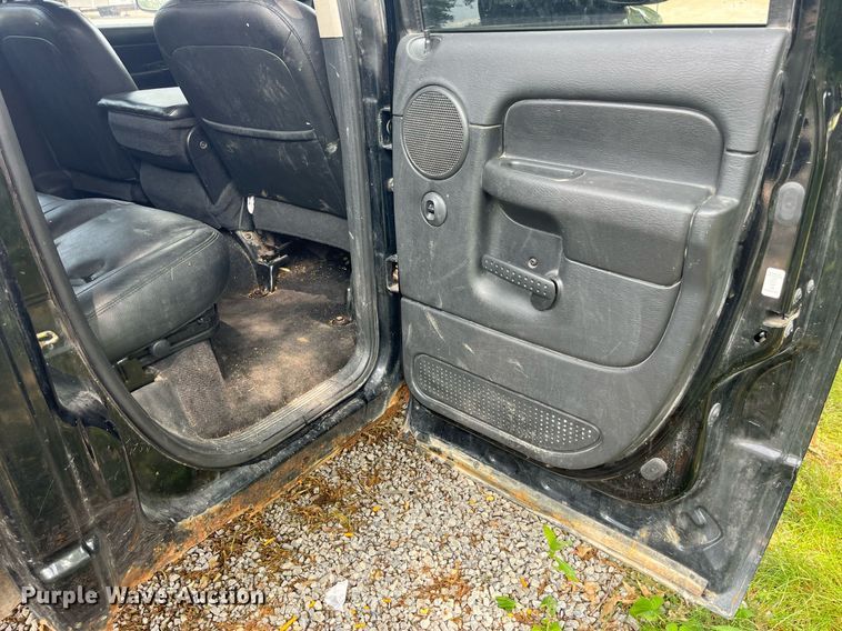 image for item DP0512 2004 Dodge Ram 1500  Quad Cab flatbed pickup truck