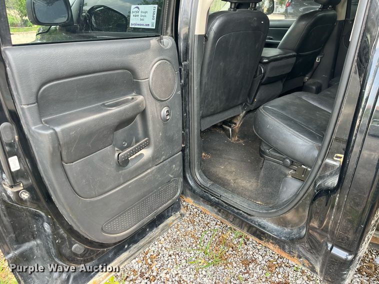 image for item DP0512 2004 Dodge Ram 1500  Quad Cab flatbed pickup truck