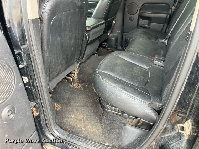 image for item DP0512 2004 Dodge Ram 1500  Quad Cab flatbed pickup truck