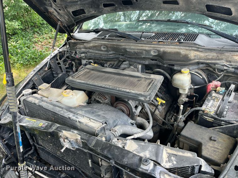 image for item DP0512 2004 Dodge Ram 1500  Quad Cab flatbed pickup truck